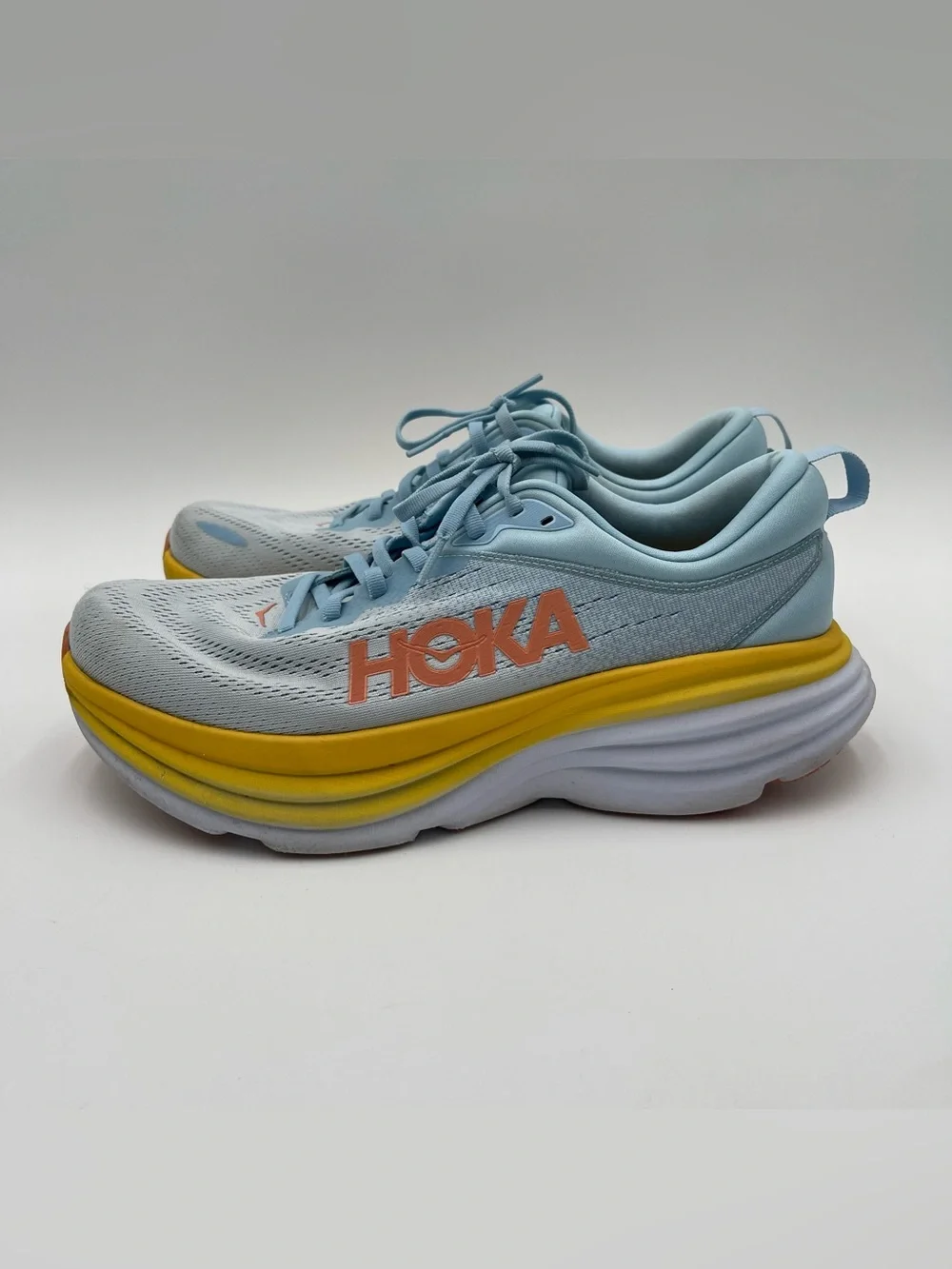 Hoka Women's Light Blue with Yellow & Orange Accent Running Shoes